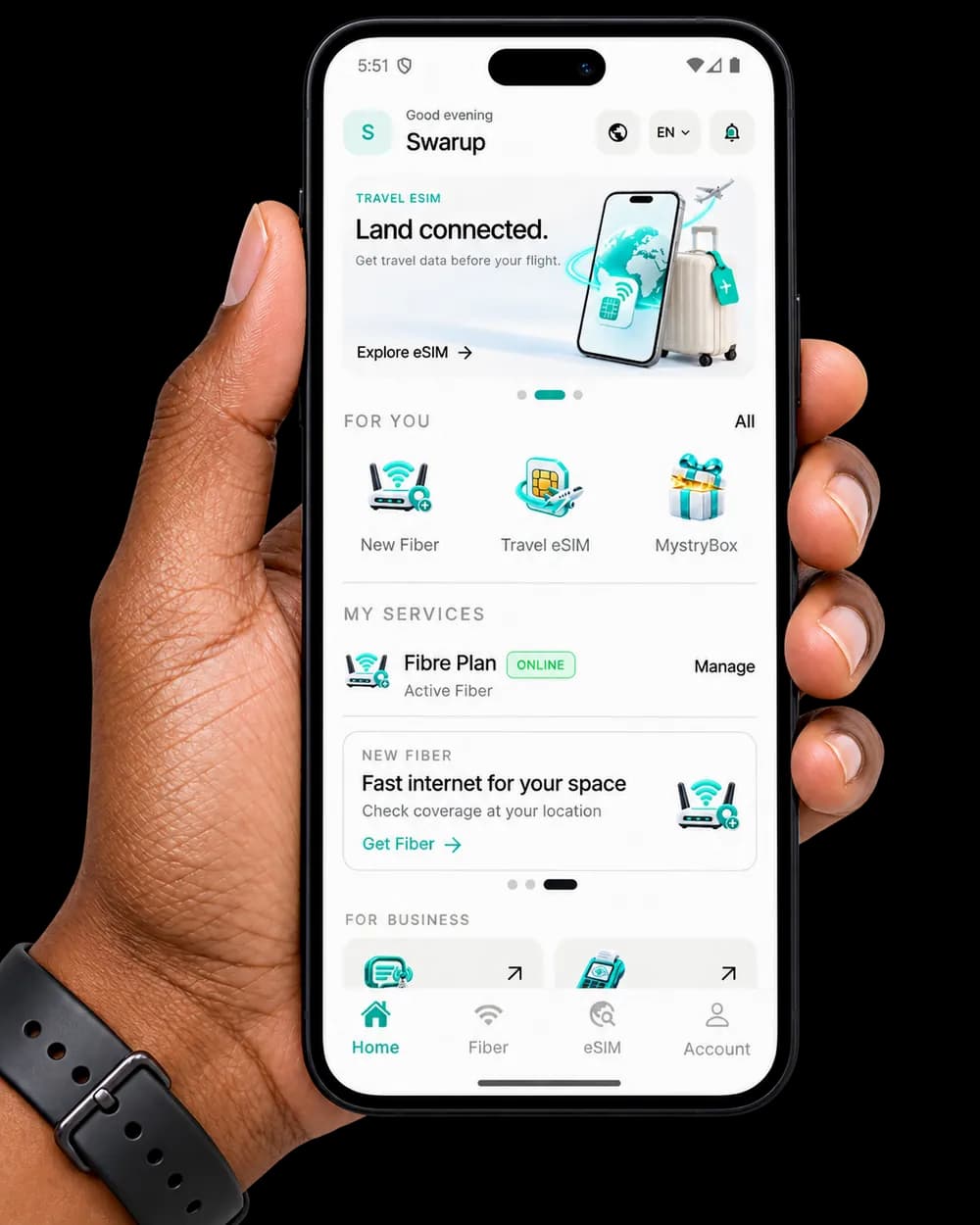 Hand holding a phone with the MyTele app open